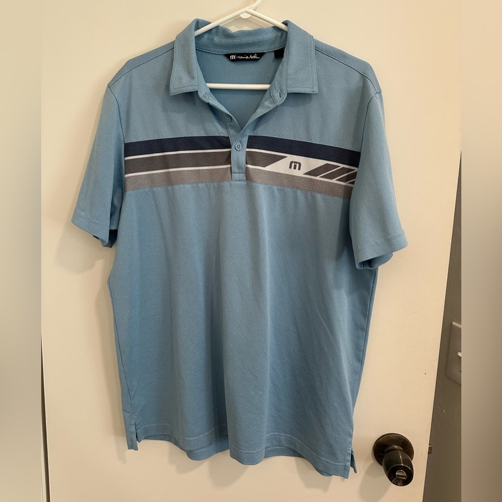 Travis Mathew Light Blue Polo with Stripes